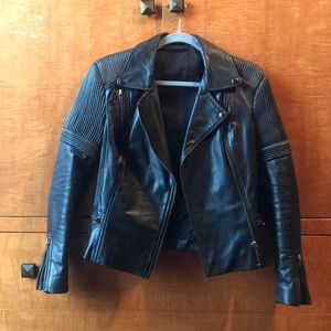 Distressed gently used leather jacket